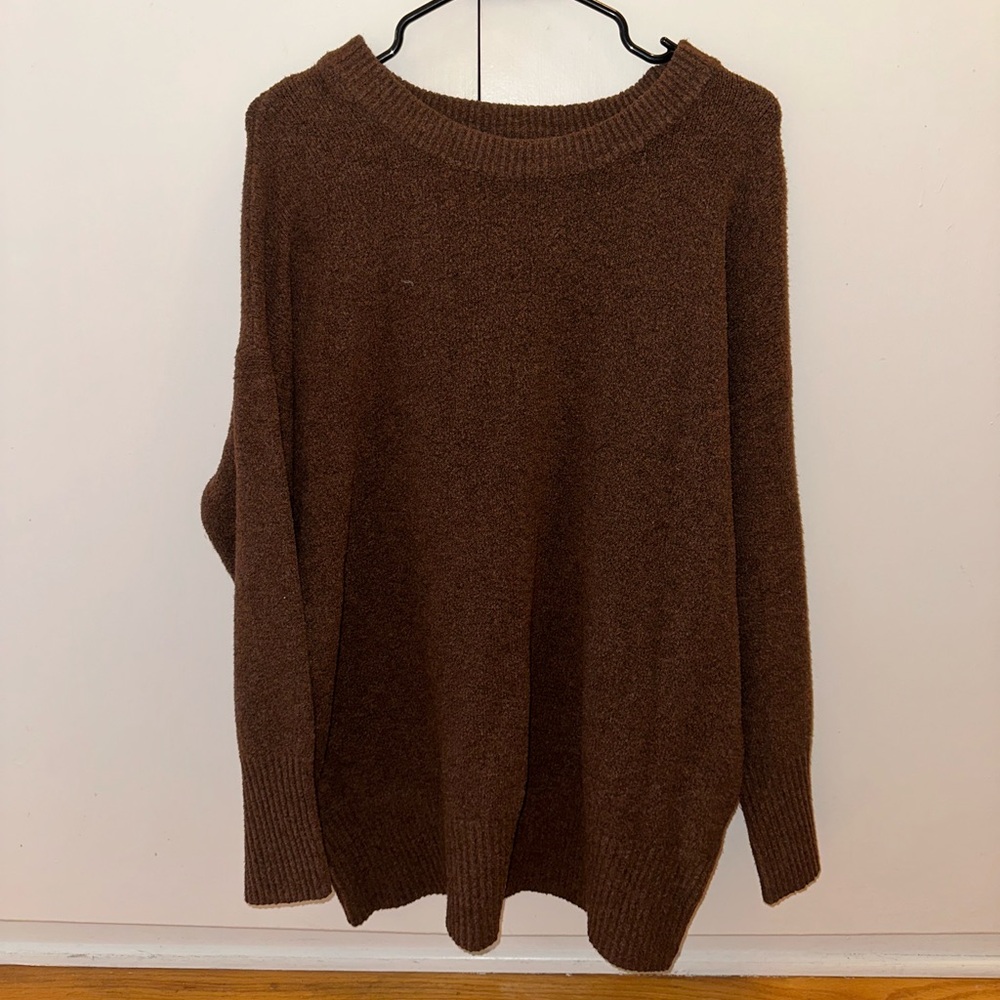 brown sweater by a new day